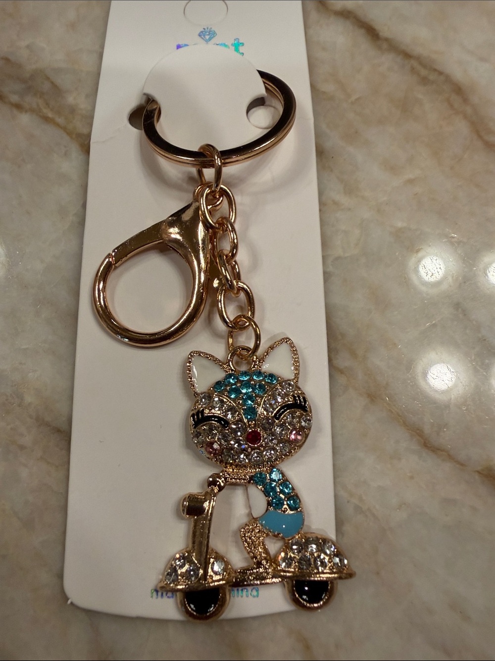 Mint Gold-Tone Cat on Scooter Keychain with Turquoise and Clear Crystals